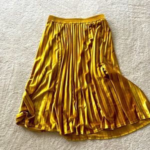 A New Day Gold Velvet Skirt. Worn only once. Midi length. Dress up or down.